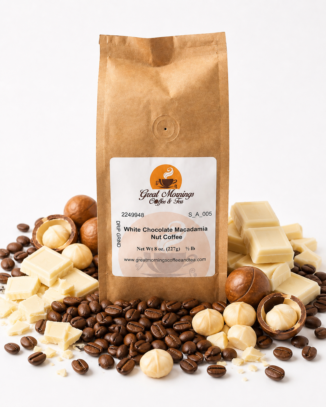 A kraft paper bag of Good Morning Coffee & Tea White Chocolate Macadamia Nut Coffee stands upright on a white background, surrounded by coffee beans, white chocolate chunks, and macadamia nuts.