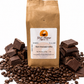Brown paper bag of 'Dark Chocolate Coffee' with chocolate pieces and coffee beans on a white background