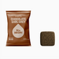Tea Drops Chocolate Earl Grey tea package with a sample tea cube on a white background