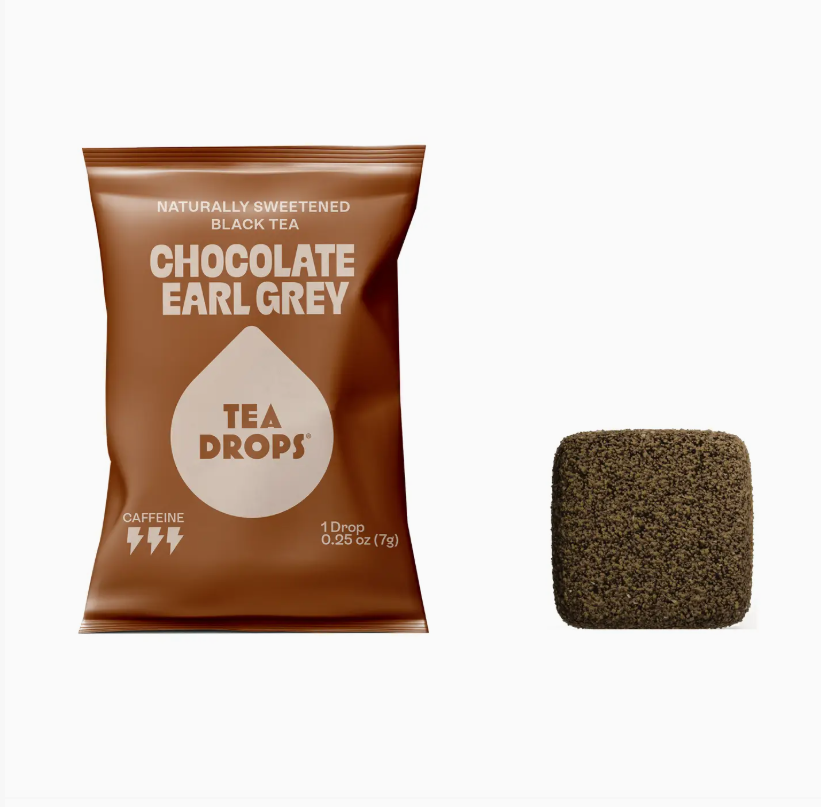Tea Drops Chocolate Earl Grey tea package with a sample tea cube on a white background