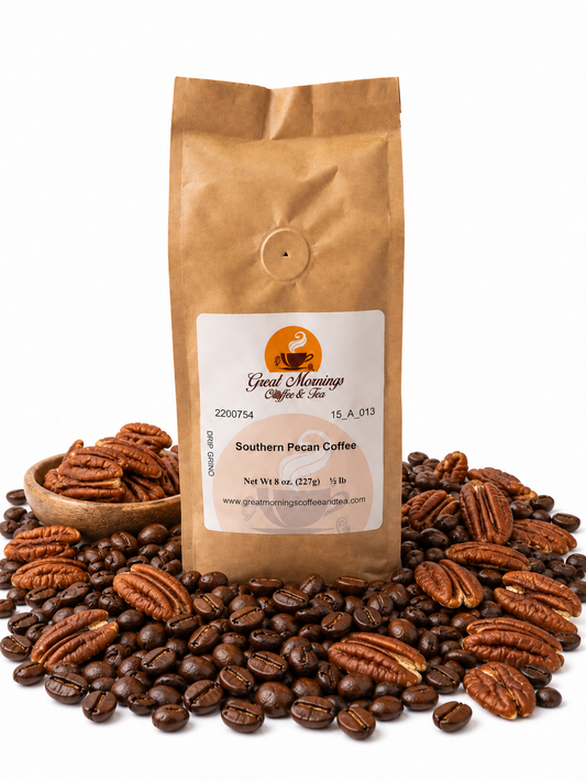 Great Mornings Coffee & Tea Southern Pecan Coffee in a kraft bag on a white studio background, surrounded by roasted coffee beans and whole pecans.